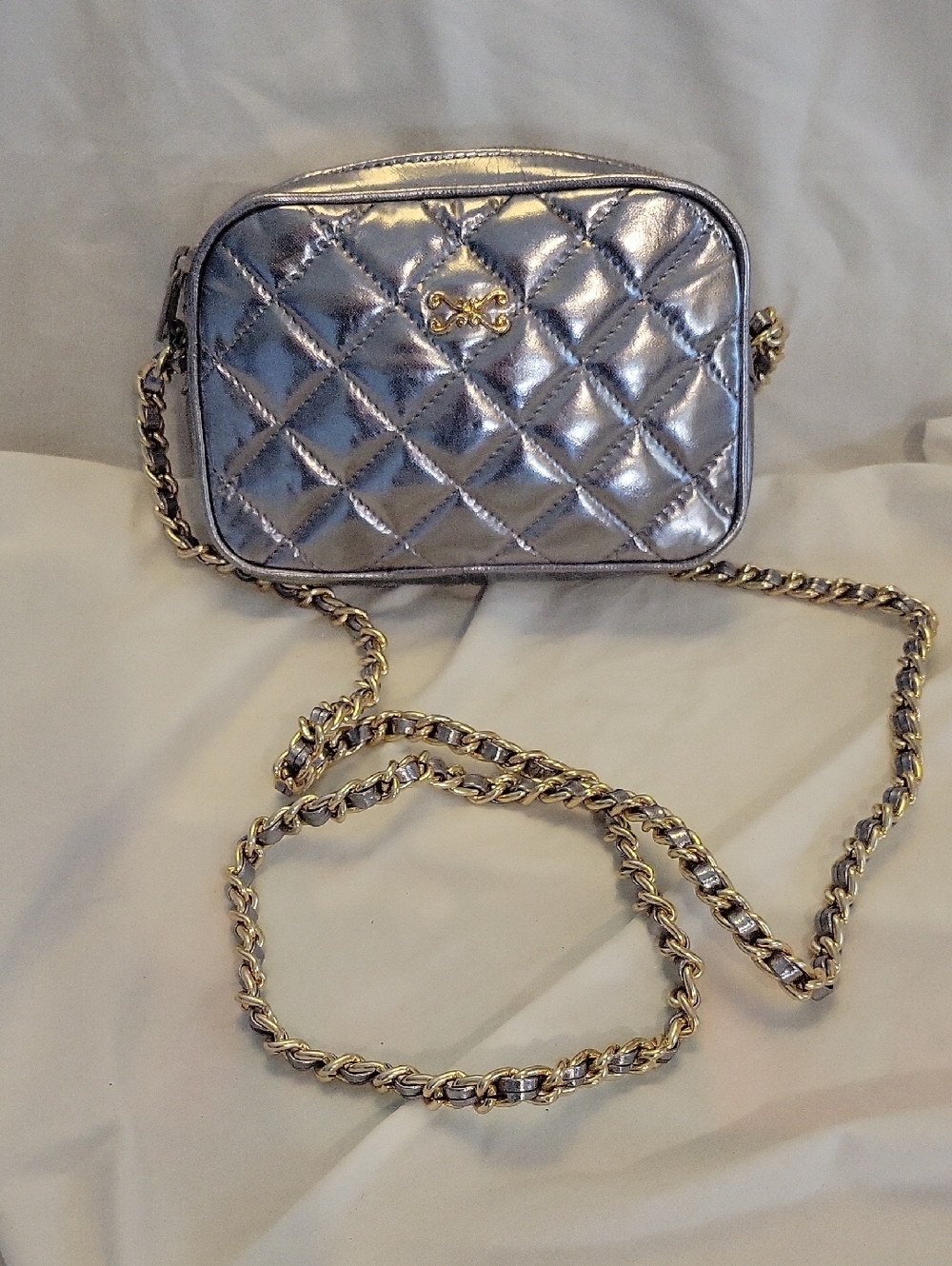 Magnum Silver Metallic Quilted Crossbody Bag with Chain Strap